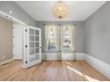 Bright office space featuring hardwood floors, neutral walls, and natural light at 3465 Beeler Ct, Denver, CO 80238
