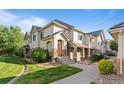 Charming townhome features a well-maintained lawn, stone accents and a private entrance, offering comfortable living at 22580 E Ontario Dr # 204, Aurora, CO 80016