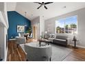 Bright living room features a neutral color palette, lots of natural light, and an open floor plan at 22580 E Ontario Dr # 204, Aurora, CO 80016