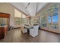 Elegant dining room with high ceilings, large windows, and stunning outdoor views at 22683 Hagler Dr, Golden, CO 80401