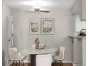 Cozy dining area with a modern table and chairs, perfect for intimate meals at 8555 Fairmount Dr # D204, Denver, CO 80247