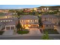 View of the attractive two-story home and well-maintained front yard, complemented by nearby neighborhood features at 10601 Montecito Dr, Lone Tree, CO 80124