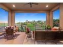 Inviting outdoor patio area with comfortable seating and views of the neighborhood at 10601 Montecito Dr, Lone Tree, CO 80124