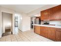 Spacious kitchen features tile flooring and an open design at 12662 W Virginia Ave, Lakewood, CO 80228