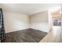 Open living room showcasing a view of the backyard and hardwood flooring at 12662 W Virginia Ave, Lakewood, CO 80228
