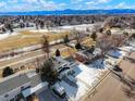 Home situated on a quiet street with views of the distant mountains at 6190 W Canyon Ave, Littleton, CO 80128