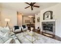 Inviting living room featuring a cozy fireplace, stylish decor, and comfortable seating at 4221 S Blackhawk Cir # 7G, Aurora, CO 80014