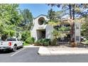 Attractive exterior of a condo building with landscaping and parking at 9680 Brentwood Way # 203, Broomfield, CO 80021