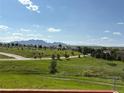 Expansive mountain views and lush green landscape offering a serene, picturesque setting at 3223 Castle Peak Ave, Superior, CO 80027