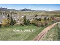 Aerial view of 4346 S. Quail St. showcasing the property, landscaping, and surroundings at 4346 S Quail St, Littleton, CO 80127