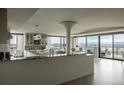 Spacious open-concept kitchen with granite countertops and city view at 1133 14Th St # 3430, Denver, CO 80202