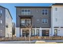Charming, modern two-story home with eye-catching curb appeal and a small, cozy balcony at 2052 Alcott Way, Broomfield, CO 80023