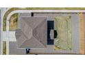 Aerial view of a home showcasing the roof, backyard, and surrounding neighborhood at 17847 E 95Th Ave, Commerce City, CO 80022