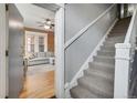 Apartment entryway with view of living room and staircase at 1341 N Washington St # 4, Denver, CO 80203