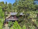 Beautiful mountain home with decks overlooking the natural landscape at 32171 Lodgepole Dr, Evergreen, CO 80439