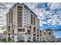 Beautiful exterior of the building featuring architectural details and multiple balconies at 925 N Lincoln St # 8E-S, Denver, CO 80203