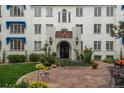 Elegant exterior with a well-manicured lawn, stone patio, and vibrant flower beds adds curb appeal at 844 N Humboldt St # 5, Denver, CO 80218