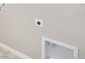 A close-up of a wall with a electrical outlet and a box at 13477 Valentia St, Thornton, CO 80602