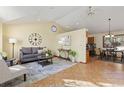 Bright living room features vaulted ceiling, and an open floor plan at 1749 Foster Dr, Longmont, CO 80501