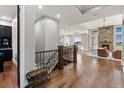 A gorgeous entryway with wood floors leads into the open living room at 29303 E 165Th Ave, Brighton, CO 80603