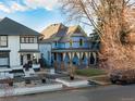 House location view with city skyline in background at 2431 N Ogden St, Denver, CO 80205