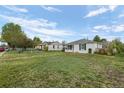 Wide yard shot, this house has a generous lawn at 3715 N Jackson St, Denver, CO 80205