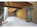 Hallway view with wooden stairs in a neutral-toned building at 2711 Mapleton Ave # 1, Boulder, CO 80304