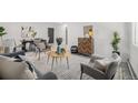 Comfortable living room with neutral walls, large rug, and plenty of seating for Gathering and guests at 1580 S Krameria St, Denver, CO 80224
