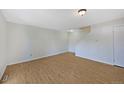 A spacious living room with hardwood floors, neutral paint, and ample natural light, perfect for relaxation at 8019 Wolff # G, Westminster, CO 80031