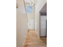 Bright entryway with hardwood floors and a staircase at 10219 Vine Ct, Thornton, CO 80229