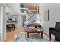 Bright living room with vaulted ceilings and an open floor plan at 2092 S Helena St # C, Aurora, CO 80013