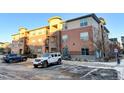 Apartment building with parking and landscaping at 4100 Albion St # 504, Denver, CO 80216