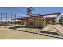 Baseball field concession stand with shaded seating area and restrooms at 2080 S Haleyville Way, Aurora, CO 80018