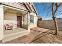 Inviting front porch features a cozy seating area perfect for relaxing outdoors at 3135 California St, Denver, CO 80205