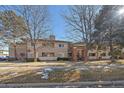 Condo building exterior with trees and walkway at 770 Copper Ln # 206, Louisville, CO 80027