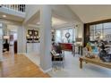 Bright and open living room featuring neutral colors, hardwood floors and stylish furniture at 22921 E Euclid Cir, Aurora, CO 80016