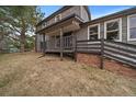 Inviting home exterior showcasing the front porch, well-maintained yard, and natural light at 8165 Tempest Ridge Way, Parker, CO 80134