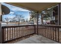 Private patio with stone flooring and views of the parking lot at 7820 W 87Th Dr # K, Arvada, CO 80005