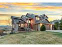 Beautiful two-story home exhibiting well-maintained lawn and an attached two-car garage at 4534 Palmer Ct, Longmont, CO 80503