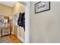 Traditional entryway with hardwood floors, coat rack, and framed picture on wall at 2215 Meade St, Denver, CO 80211