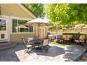 Inviting backyard patio with outdoor seating and charming details for relaxation at 16102 Grebe Pl, Parker, CO 80134
