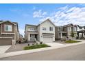 Charming two-story home featuring a well-kept lawn and a two-car attached garage at 199 Simmental Loop, Castle Rock, CO 80104