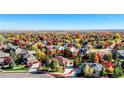 Wide aerial showcasing the home and surrounding neighborhood at 449 Meadow View Pkwy, Erie, CO 80516