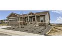 Inviting single-Gathering home with a two-car garage and drought tolerant front yard at 483 Agoseris Way, Castle Rock, CO 80104