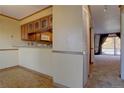 Kitchen with light wood cabinets and parquet floors at 112 S Holman Way, Golden, CO 80401