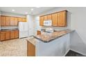 Functional kitchen with ample cabinet space and modern appliances at 2360 Santa Fe Dr # B, Longmont, CO 80504