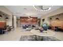 A modern lobby boasts artistic lighting, comfortable seating, and stylish decor, creating a welcoming atmosphere at 20 Wilcox St # 302, Castle Rock, CO 80104