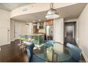 Modern kitchen with an island, stainless steel appliances, and a breakfast bar at 891 14Th St # 3807, Denver, CO 80202