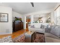 Inviting living room featuring hardwood floors, neutral walls and stylish furniture at 2846 Central Park Blvd, Denver, CO 80238