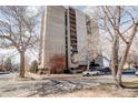 Full exterior view of a high-rise condo building with balconies at 1433 N Williams St # 407, Denver, CO 80218